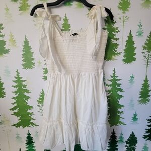 Black Tape Smocked Babydoll Dress.